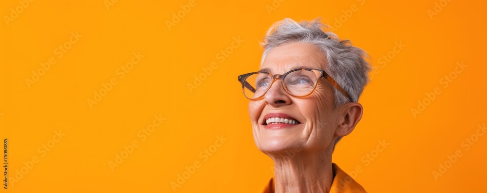 Old woman smile on color background - obrazy, fototapety, plakaty 