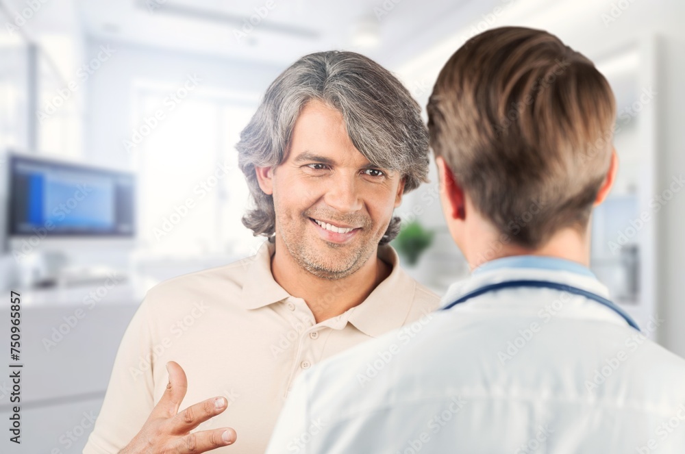 Doctor consulting  patient at modern clinic