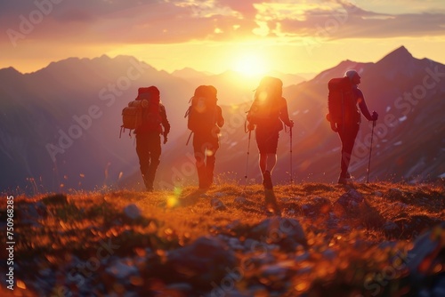 A group of people walking up a hill at sunset. Suitable for travel and outdoor activities