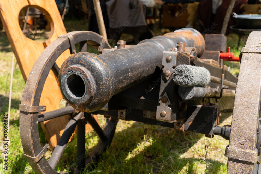 Rusty medieval cannon in a camp Rusty medieval cannon in a camp