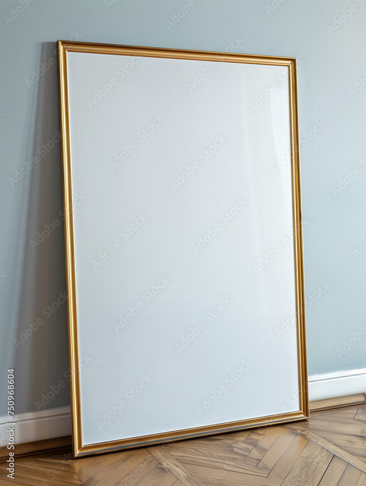 Elegant Golden Framed Blank Canvas Leaning Against Blue Wall
Elegant Golden Framed Blank Canvas Leaning Against Blue Wall