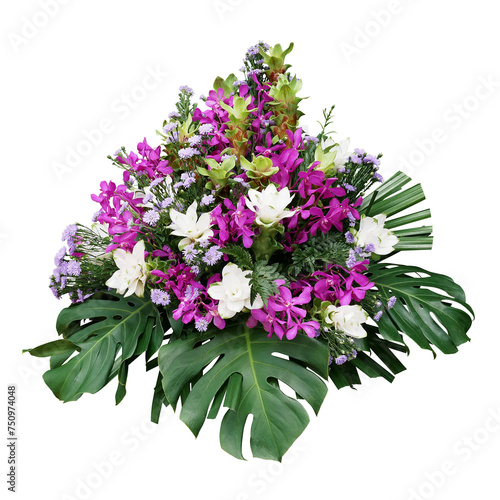 Wedding floral decoration with tropical foliage plants (Monstera, fern, lady palm) and exotic flowers (purple orchids and Curcuma), floral arrangement bouquet