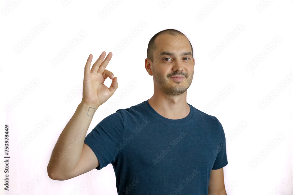 expressive bald man in blue tshirt expressive bald man in blue tshirt