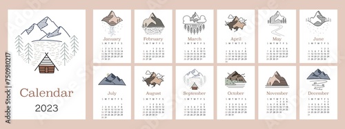 Flat lunar calendar for 2023. Minimalist calendar with landscape and mountains. The week starts on Sunday. Illustrations in a rustic style... photo