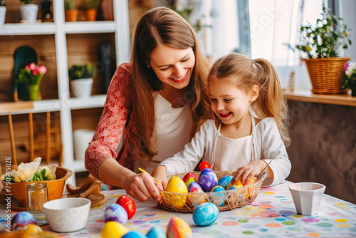 Woman and Little Girl Painting Easter Eggs
