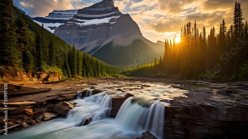 Sunset in Glacier National Park, Montana, USA. Scenic view of the waterfall.
