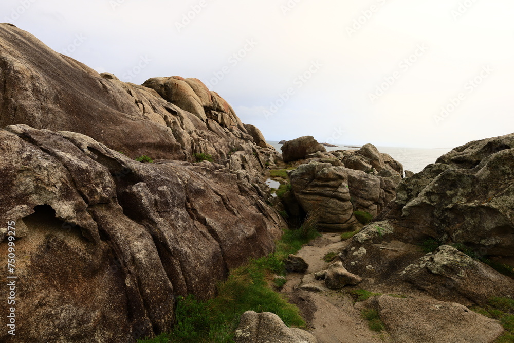 Los Acantilados de papel located near the Punta de Morás, are magnificent granite rock formations of extraordinary beauty Los Acantilados de papel located near the Punta de Morás, are magnificent granite rock formations of extraordinary beauty