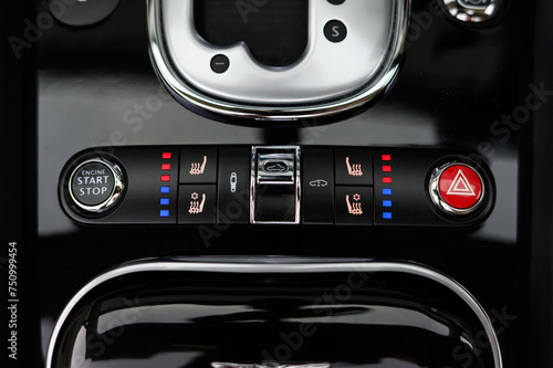 Luxury car options of heated and cooled seats and start button