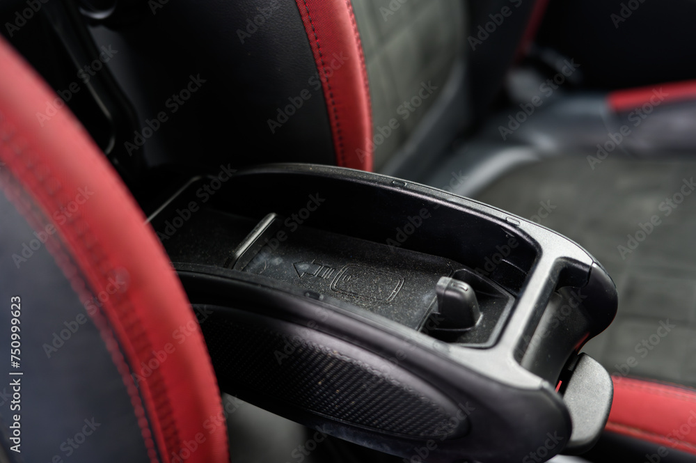 Wireless phone charger in a car Wireless phone charger in a car