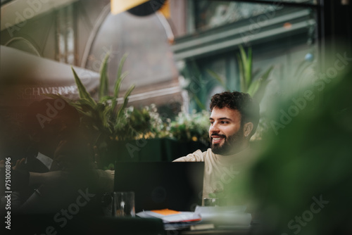Cuadro en lienzo Multiethnic team of business partners working together in a casual restaurant setting