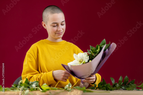 short hair girl in yellow with bouquet of flowers