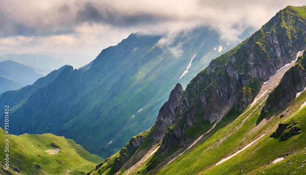 mysterious beauty of fagaras nature scenery on a hazy weather in summer mountain landscape with rocky hills