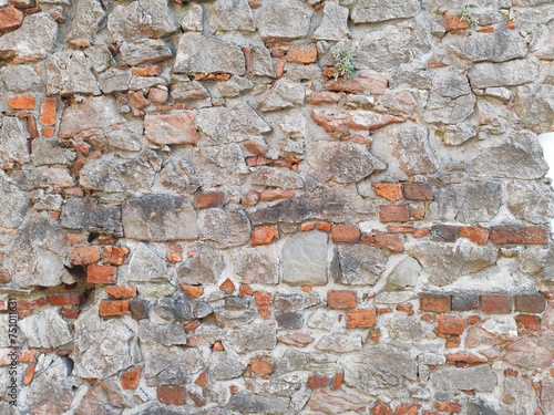 old wall - stone and bricks © Anna