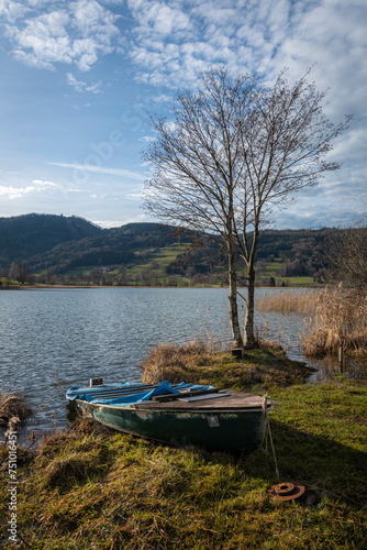 Old boat in Zell am Moos on Irrsee, a lake in the Salzkammergut, Austria that is drained by the Zeller Ache towards the Mondsee