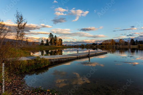 Beautiful sunset view reflection in the pond. Frenchtown Pond State Park in Montana photo