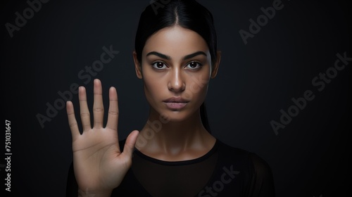 Woman show palm hand against racial gender discrimination