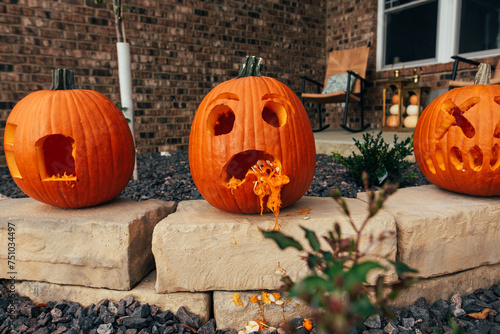 Seeds spewing out of pumpkin. 