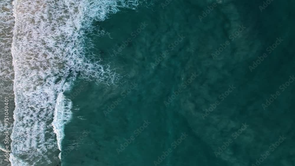 Waving ocean. Foamy turquoise water surface sparkling. Aerial top view shot Waving ocean. Foamy turquoise water surface sparkling. Aerial top view shot