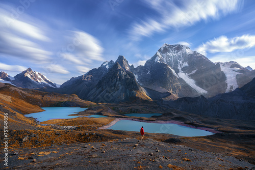 Single traveler in the epic mountain landscape of the Peruvian andes. photo