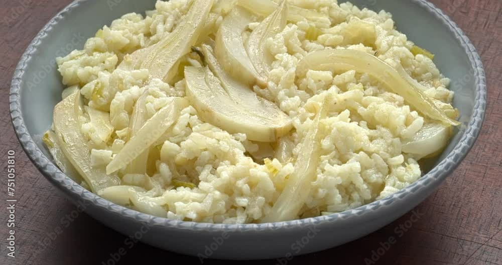 Risotto with fennel and arborio rice. Italian cuisine. Table spin. Risotto with fennel and arborio rice. Italian cuisine. Table spin.