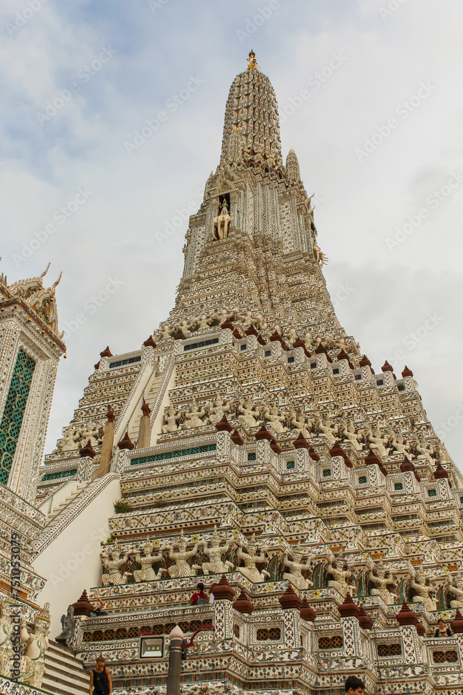 Wat Arun temple in a blue sky in Bangkok, Thailand.