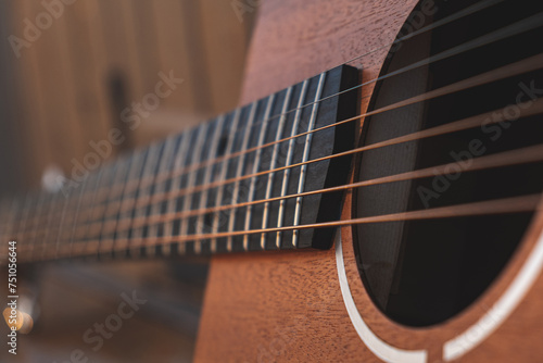 Close up shot of guitar. 
 photo