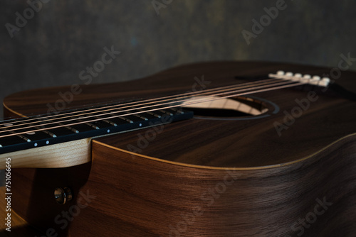 Close up shot of guitar. 
 photo