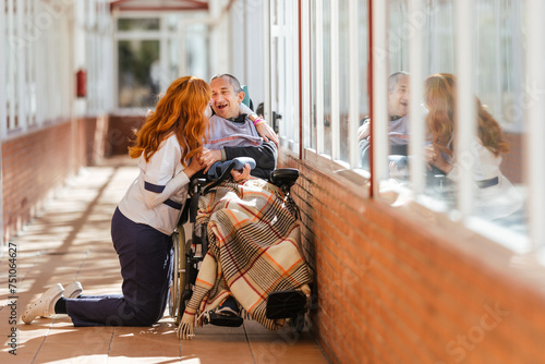 Resident of a mental disability center with their caregiver