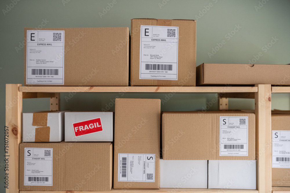© Milles Studio/Stocksy - Carton packages with labels on shelves © Milles Studio/Stocksy - Carton packages with labels on shelves