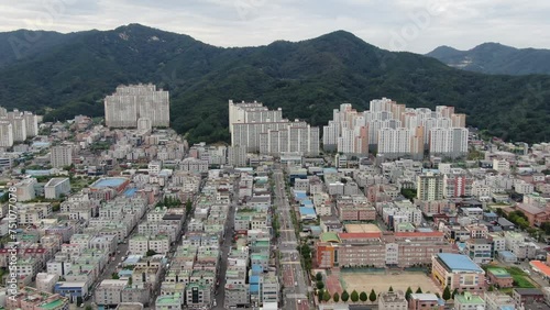Panoramic view of houses, shops, and apartments in Bongok-dong, Gumi-si, Gyeongsangbuk-do, Korea photo