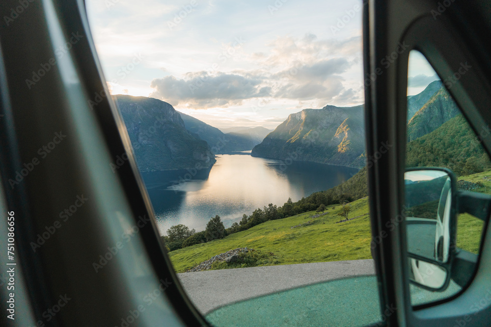 Norwegian landscape visible from camper van window Norwegian landscape visible from camper van window