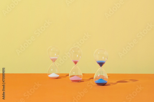 An hourglass is a device used to measure the passage of time. photo