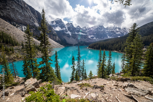 Beautiful and colorful Lake Moraine seen through the trees.