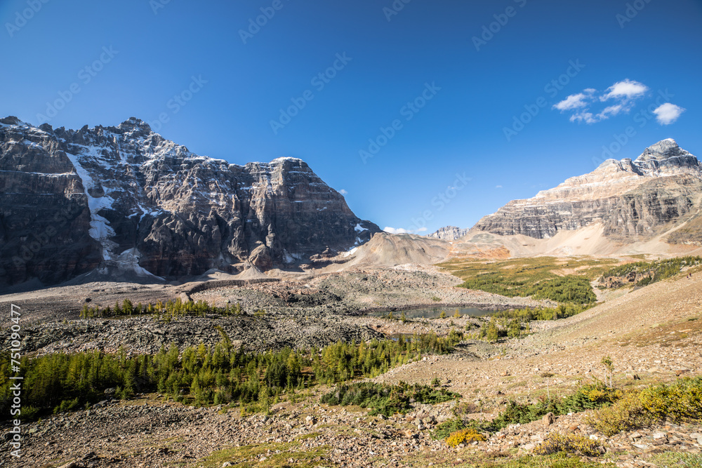 A mountain range with a clear blue sky.