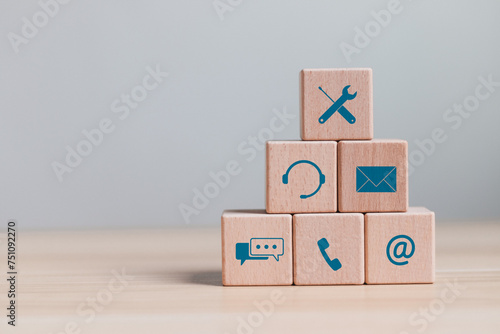 Technical support customer service concept. Wooden block with support customer icon for customer support center and contact us, call center and customer service help.
