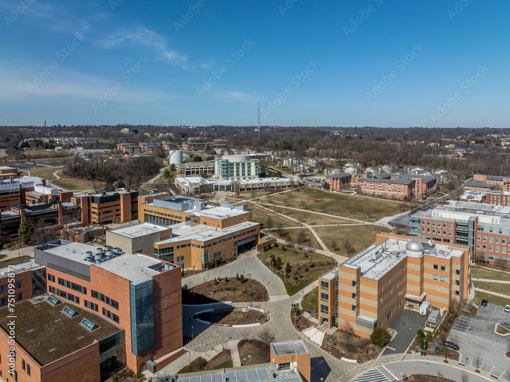 Aerial view of University of Maryland Baltimore County UMBC Catonsville admission office, pool, commons, quad, Honors college, admission office, retriever activities center, kuhn plaza, erickson field