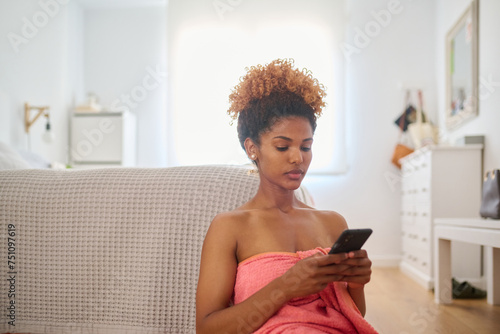 Woman check emails at home. photo
