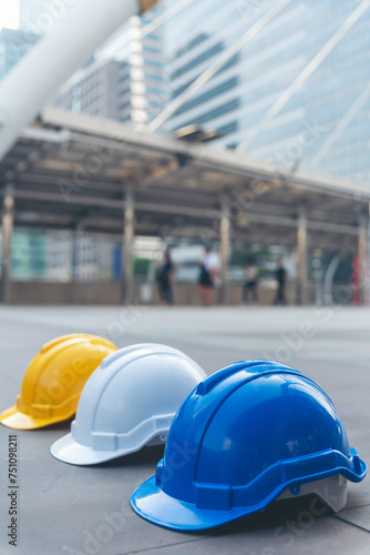 Construction hard hat vertical safety tools equipment workers in construction site engineering protection head on wood wall. Engineering Construction Vertical Many hard hat row helmet with copy space