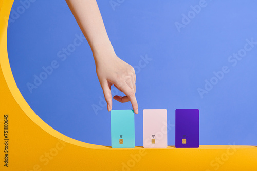 Hand holding credit card and pick take to shopping.