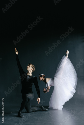 Ballet choreographers training. Dancing separately. Studio work photo