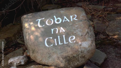 Tobar na Cille spring sign engraved in rock. photo