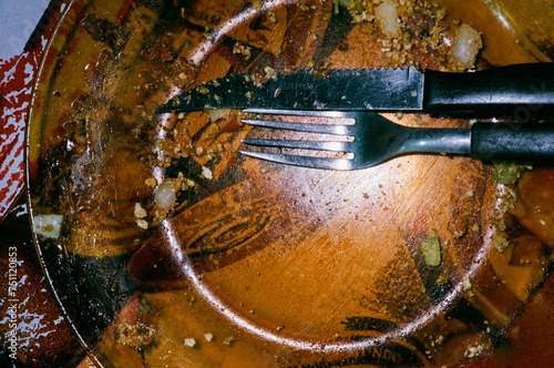 Empty plate after delicious traditional Brazilian barbecue photo