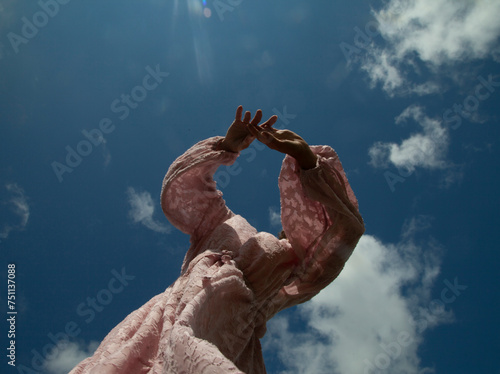 Girl is dacing in the sky photo