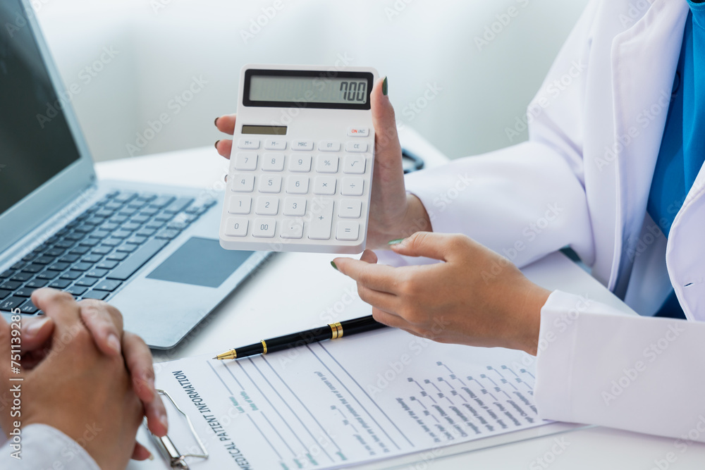 oral dentistry Female dentist in machine talking with male patient on table in clinic, dental model, dental health care according to prescription oral dentistry Female dentist in machine talking with male patient on table in clinic, dental model, dental health care according to prescription
