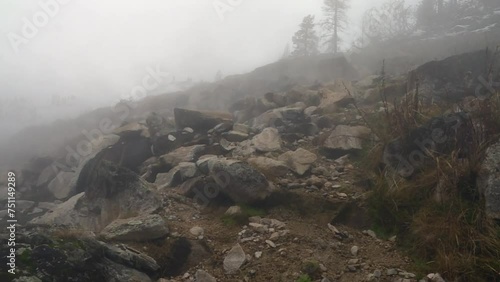 Atmospheric Rock Mountains Trails In Boise National Forest, Idaho, USA. Tilt-down Shot photo