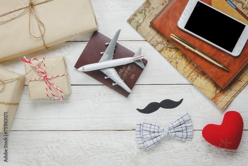 Top View Happy Father Day With Travel Airplane Passport Rustic Wooden Background Accessories With Map Mustache Vintage Bow Tie Pen Present Red Heart White Mobile Phone Notebook