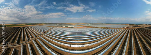Parabolic trough solar power collectors - aerial drone wide panorama photo