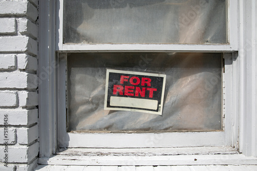 For rent sign in building window photo