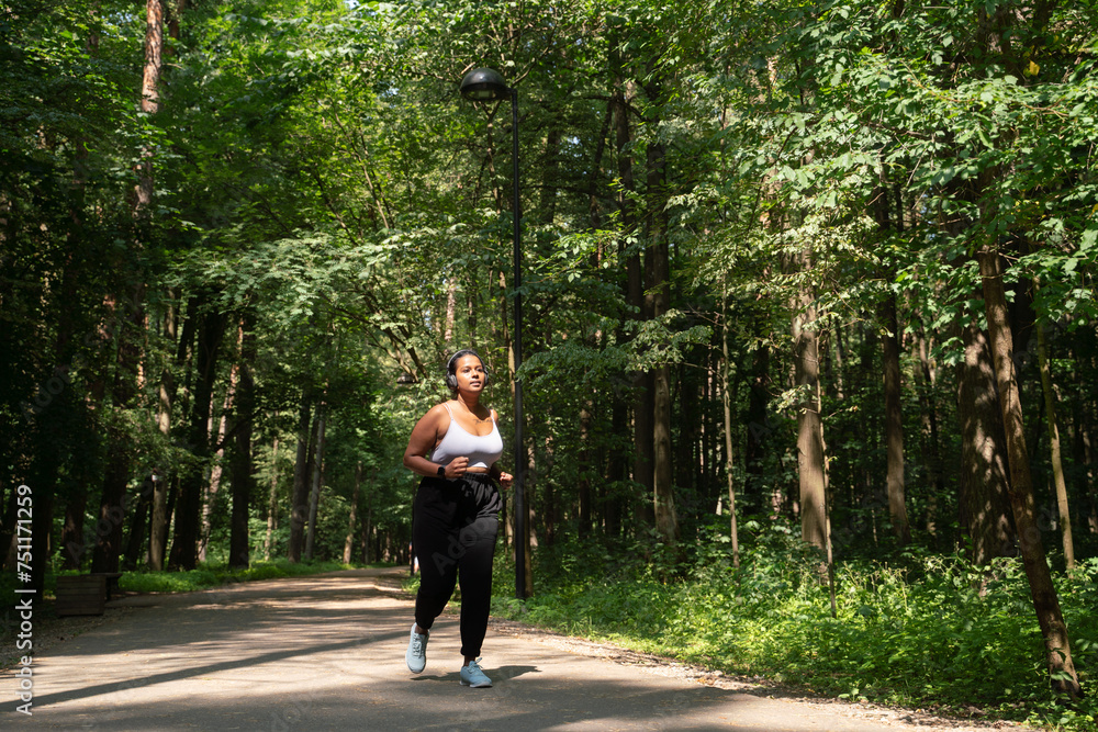 Plus Size Woman Running In The Forest Plus Size Woman Running In The Forest