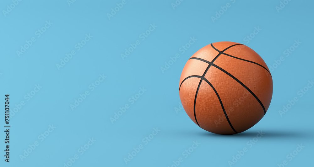 Basketball on blue background with copy space.